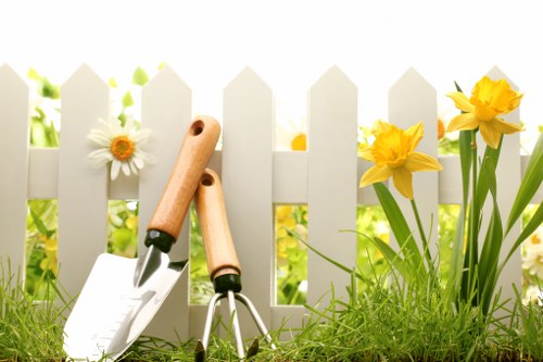 Professional landscaper working on a Pinner garden project