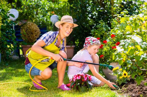 Professional landscaper enhancing curb appeal of a Pinner home